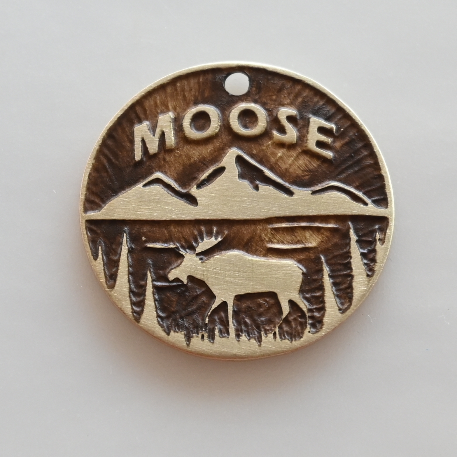 Hand-finished engraved metal pet tag